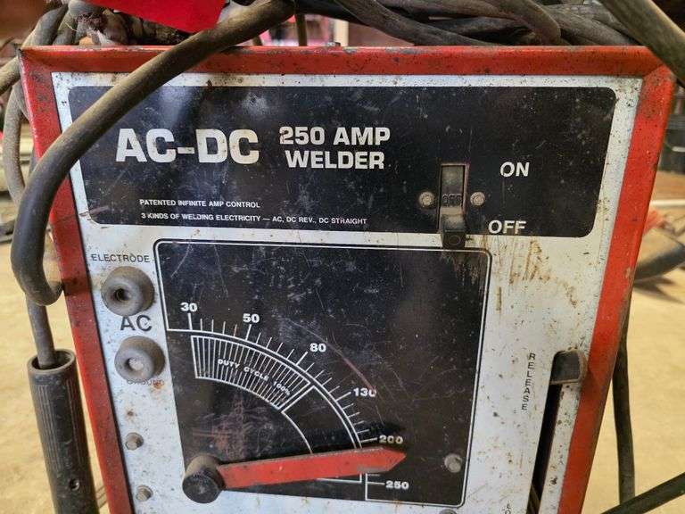 AC/DC 250 amp Welder with Leads and 2 Helmets