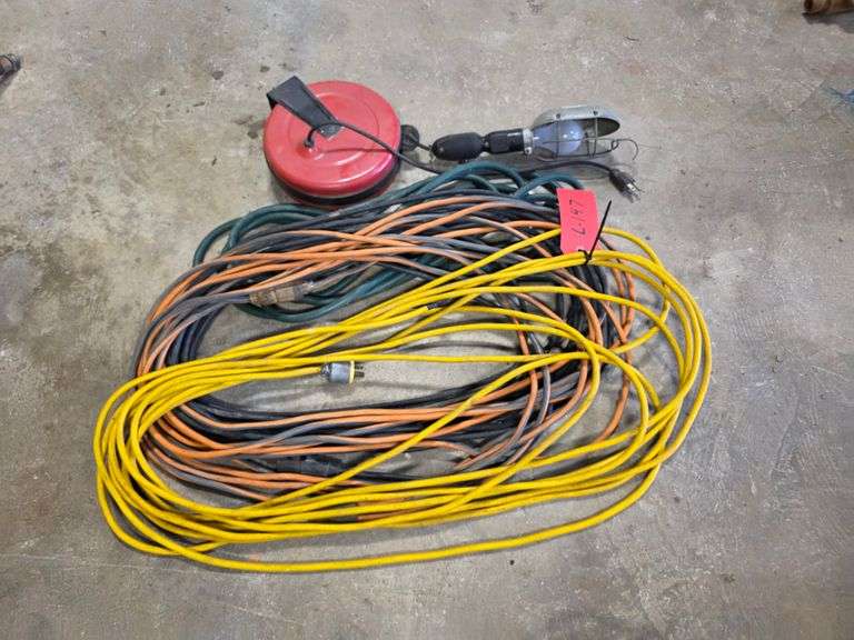 Assortment of Extension Cords and Retracting Trouble Light