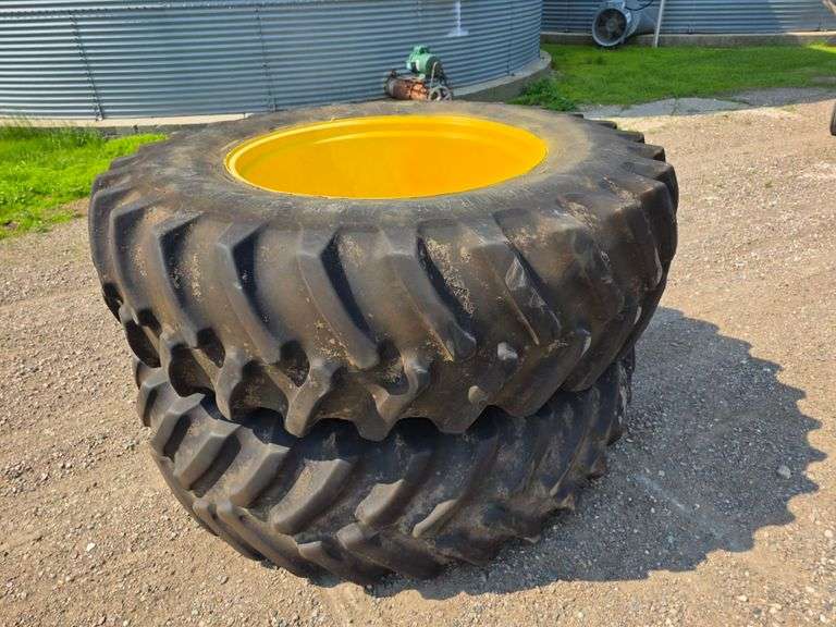 (2) 20.8R38 Duals on Yellow John Deere Dual Rims
