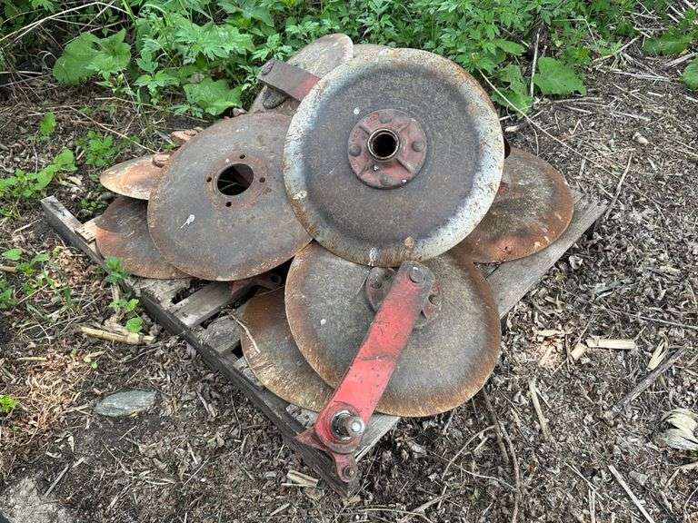 Pallet of 20” Disc Blades that Came off White Model 435 Disc Chisel, The Whole Bracket that Holds Th