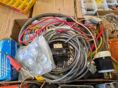 Assortment of Electrical Parts and Paint Cans