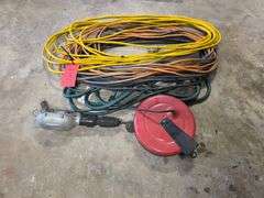 Assortment of Extension Cords and Retracting Trouble Light