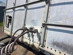 1982 Merritt 42’ Grain Trailer, 67” Sides, Spring Ride, Shur-lock Roll Tarp, 11R24.5 Tires, VIN: IMT