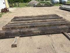 (8) 12”x12” x15’ Creosote Treated Bridge Beams, used, from a bridge at Ft Snelling