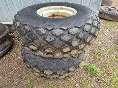 (2) 13.5 x 16 Tires on 8 Bolt Rims
