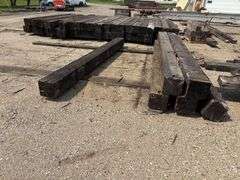 (8) 12”x12” x15’ Creosote Treated Bridge Beams, used, from a bridge at Ft Snelling