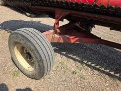 IH Model 1020 Bean Head, 25’ Wide, Bolt on Sections, Comes with 4 Wheel Header Trailer, 9.5L-14 Tire