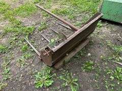 Manure Bucket that was used as a Bale Spear off a 45 Trip Bucket Loader