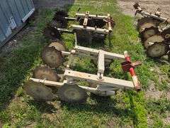 Rolling Shields off a K+M Cultivator, Made by Tebben Manufacturing