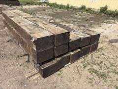 (12) 9”x13” x12’ Creosote Treated Bridge Beams, used