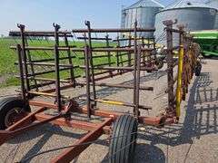 Melroe Model 452 – 12 Section 6' Coil Tine Drag, Hydraulic Down, SN: 661275 *One wing tire blew from
