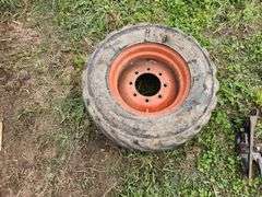 31.5x13.00-16.5 Skid Loader Tire on 8 Bolt Rim