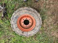 31.5x13.00-16.5 Skid Loader Tire on 8 Bolt Rim