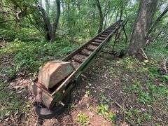 Older John Deere Flight Elevator