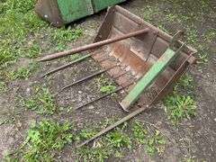 Manure Bucket that was used as a Bale Spear off a 45 Trip Bucket Loader