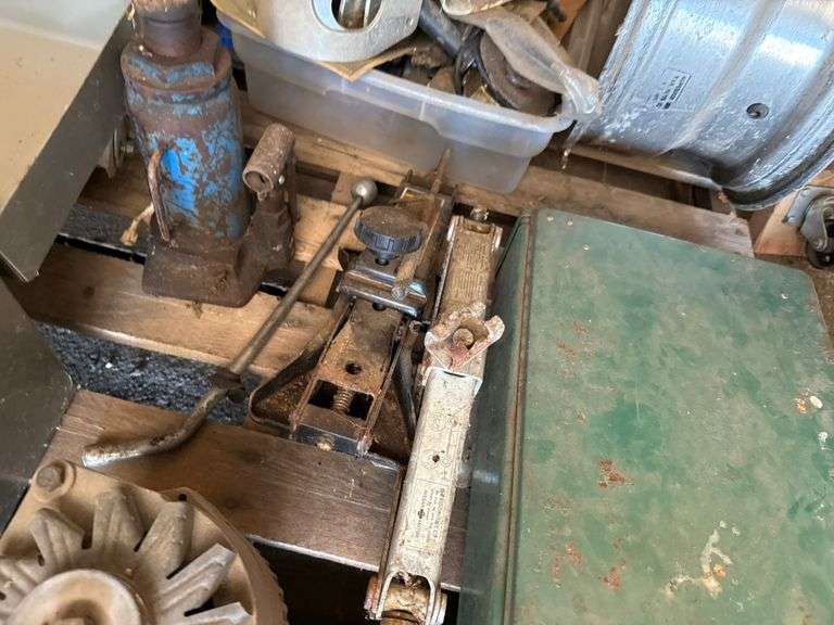 Pallet of Misc Belts, Rims, Jacks, Camping Stove