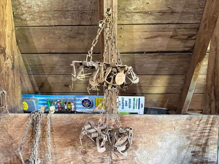 Large Trap Lot Includes (11) Mink/Muskrat Stretchers, (8) 1.5” Traps, (5) Foothold Traps, (6) 110 Tr