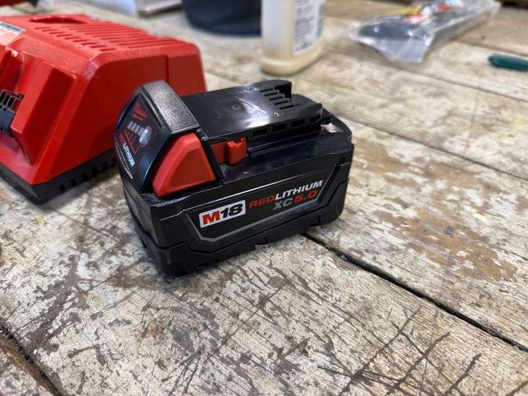 New Milwaukee M18 SC 5.0 Amp Battery and Charger