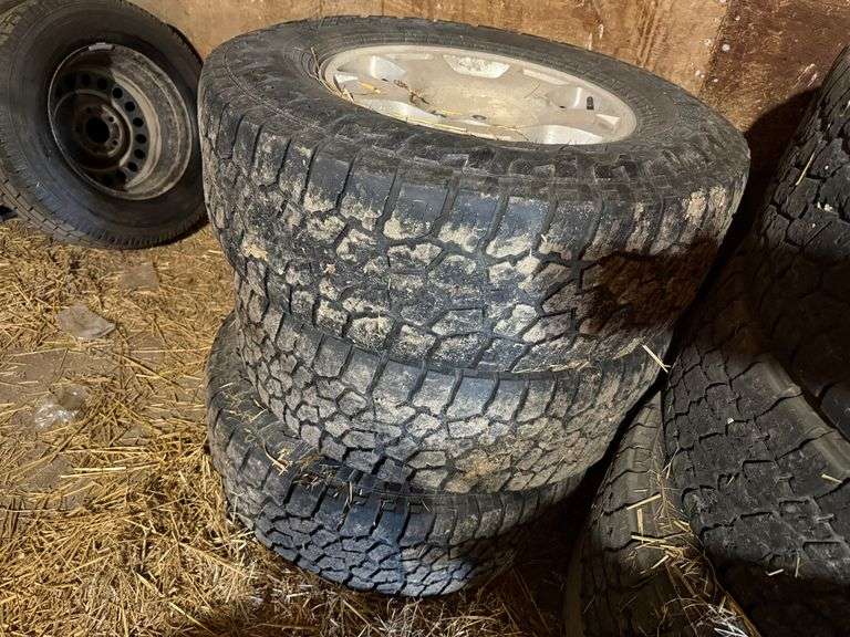 (4) Falken Wildpeak 265/70R17 Tire on Chevrolet Rim, Buying All for One Money