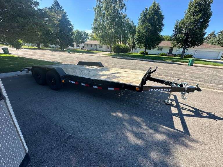 2025 PJ Model C5182 Trailer, 18’ Long, 6’11” Inside Wheel Wells, Comes with Ramps, Brakes, and LED L