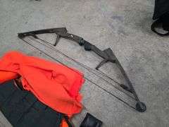2 Compound Bows, Range Finder, 2 Med/Small Blaze Orange Jackets, 2 Hats and 1 Reversible Vest