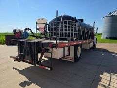 1999 International 4900 Truck with 2,350 Gallon Tank, 197,509 Miles, DT466E Engine, 6 Speed Plus Man