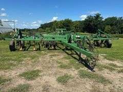 John Deere 680 Chisel Plow, 25’ Wide, Fold up Wings, Walking Tandems, 3 Bar Harrow, SN: 002635