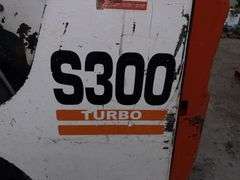 Bobcat S300 Turbo Skidloader, 12-16.5 Tires, Power Bob-Tach, Aux Hyd, A/C, Gold Package, Hand and Fo