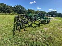 John Deere 680 Chisel Plow, 25’ Wide, Fold up Wings, Walking Tandems, 3 Bar Harrow, SN: 002635