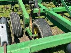 John Deere 680 Chisel Plow, 25’ Wide, Fold up Wings, Walking Tandems, 3 Bar Harrow, SN: 002635