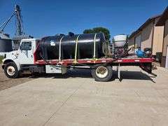 1999 International 4900 Truck with 2,350 Gallon Tank, 197,509 Miles, DT466E Engine, 6 Speed Plus Man