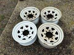 (4) 8 Bolt Spoked Trailer Rims, Buying All for One Money