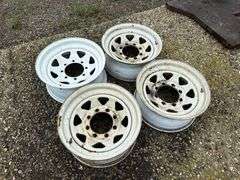 (4) 8 Bolt Spoked Trailer Rims, Buying All for One Money