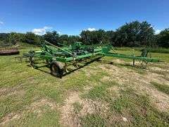 John Deere 680 Chisel Plow, 25’ Wide, Fold up Wings, Walking Tandems, 3 Bar Harrow, SN: 002635