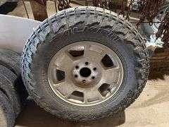 (4) Falken Wildpeak 265/70R17 Tire on Chevrolet Rim, Buying All for One Money
