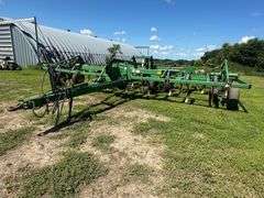 John Deere 680 Chisel Plow, 25’ Wide, Fold up Wings, Walking Tandems, 3 Bar Harrow, SN: 002635