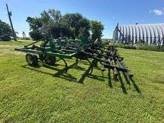 John Deere 680 Chisel Plow, 25’ Wide, Fold up Wings, Walking Tandems, 3 Bar Harrow, SN: 002635