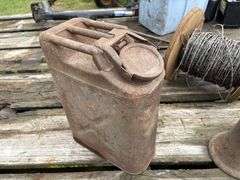 Glass Telephone Wire Insulators, Antique Screw Jack, Metal fuel can, unused barbed wire