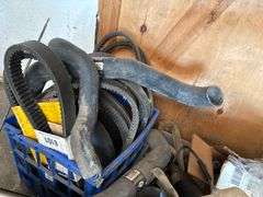 Pallet of Misc Belts, Rims, Jacks, Camping Stove