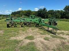 John Deere 680 Chisel Plow, 25’ Wide, Fold up Wings, Walking Tandems, 3 Bar Harrow, SN: 002635