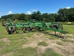 John Deere 680 Chisel Plow, 25’ Wide, Fold up Wings, Walking Tandems, 3 Bar Harrow, SN: 002635