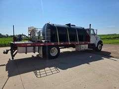 1999 International 4900 Truck with 2,350 Gallon Tank, 197,509 Miles, DT466E Engine, 6 Speed Plus Man