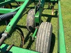 John Deere 680 Chisel Plow, 25’ Wide, Fold up Wings, Walking Tandems, 3 Bar Harrow, SN: 002635