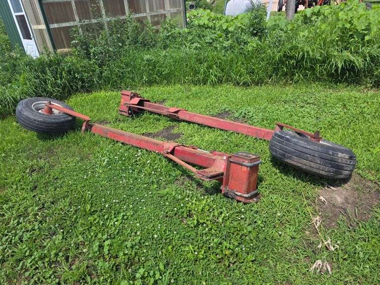 (2) Lift Assist Arms with 9.5L-14 Tires and Cylinders, off No Till Drill, Buying Both for One Money