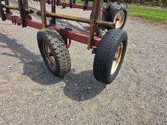 Melroe Model 452 – 12 Section 6' Coil Tine Drag, Hydraulic Down, SN: 661275 *One wing tire blew from