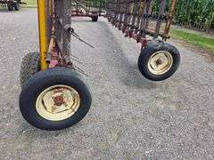 Melroe Model 452 – 12 Section 6' Coil Tine Drag, Hydraulic Down, SN: 661275 *One wing tire blew from