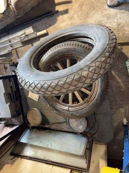 Old Car Parts including: 3 Wheels on wood spokes, 36x6 Tire, headlights, Windshield