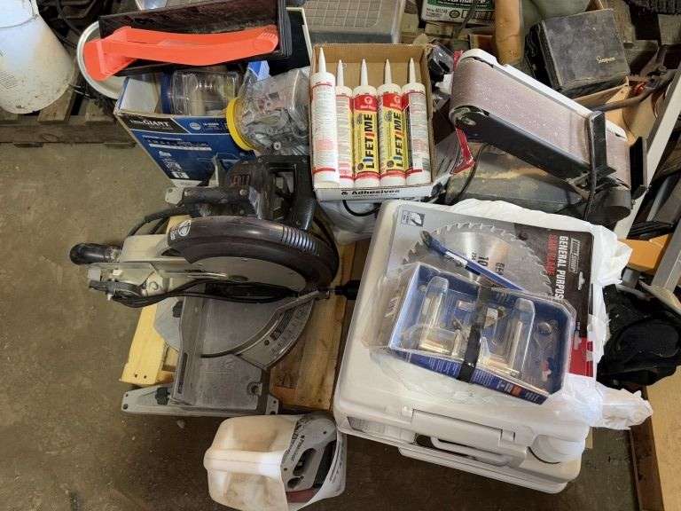 Pallet of: portable toilet, (unused), Miter Saw, Caulk, Belt Sander, and more, Buying All for One Mo