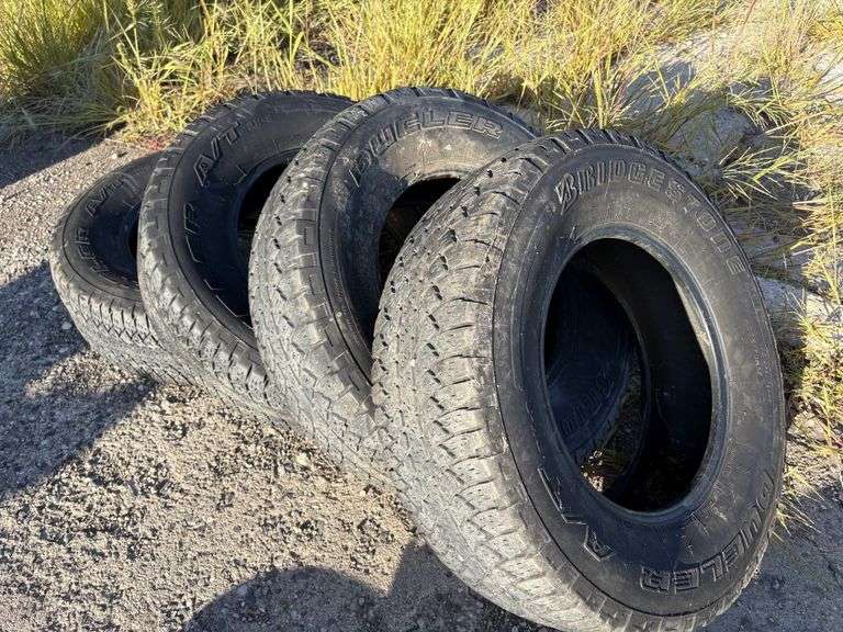 (4) Bridgestone Dueler A/T Tires, 265/70R17