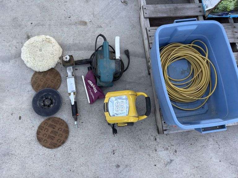 Contents of Tote: LED Shop Light; Makita Belt Sander, Air Angle Sander, with Pads; Romex Wire